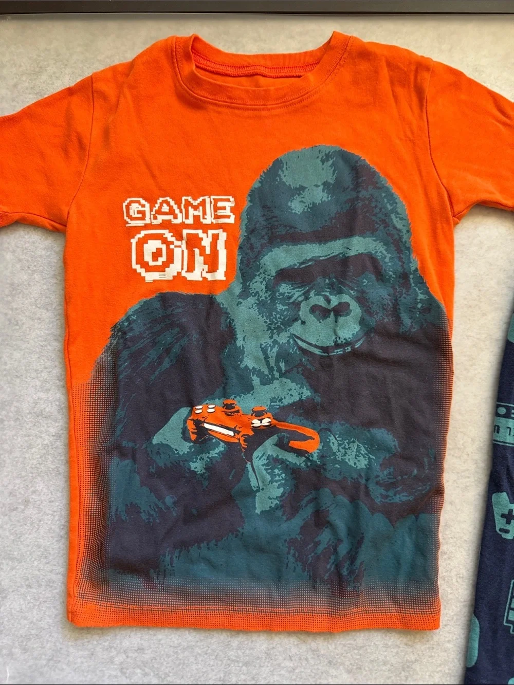 Carter kids pjs. Orange 'Game On' Gorilla Tee & Navy Gamer Shorts Set. Size 12